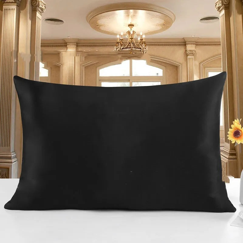 19 M double-sided silk pillowcase shown in one of 14 available colours, including apricot, sky blue, and black.