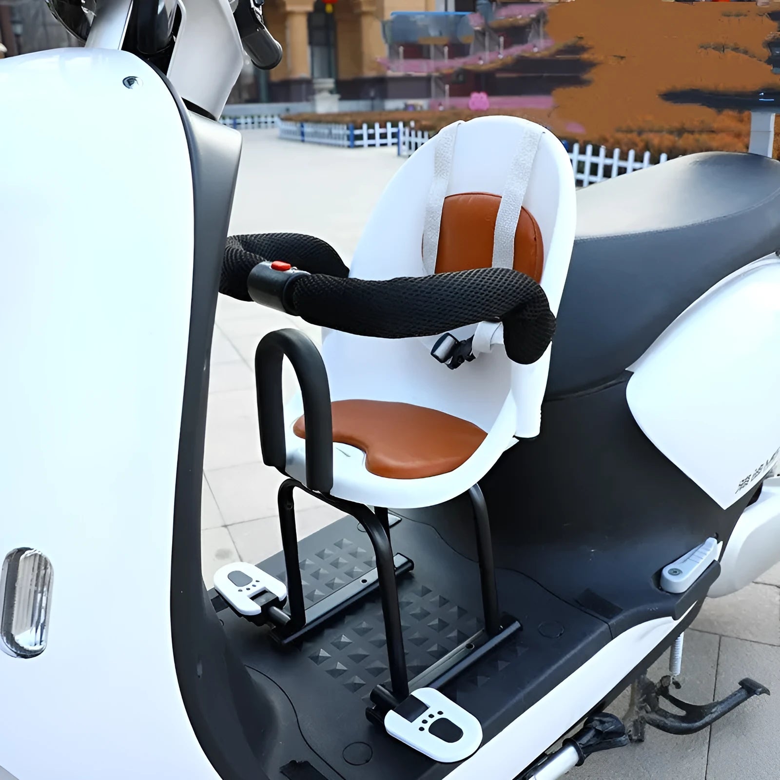 Front-mounted child seat for a battery scooter with a black high carbon steel frame.