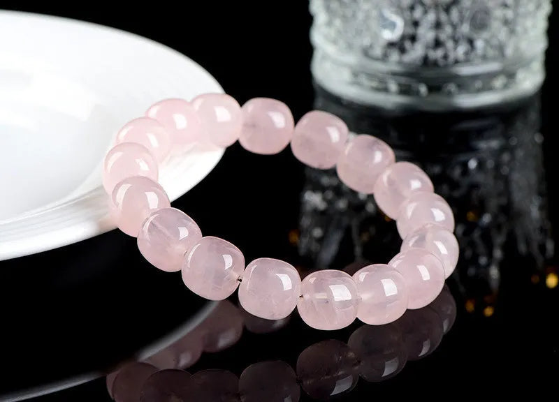 Natural bamboo style crystal barrel bead bracelet in pink with 11-12mm geometric beads