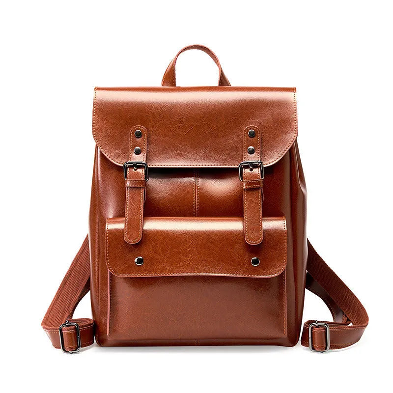 Genuine leather cowhide backpack with hard texture construction and internal lining for laptop organisation