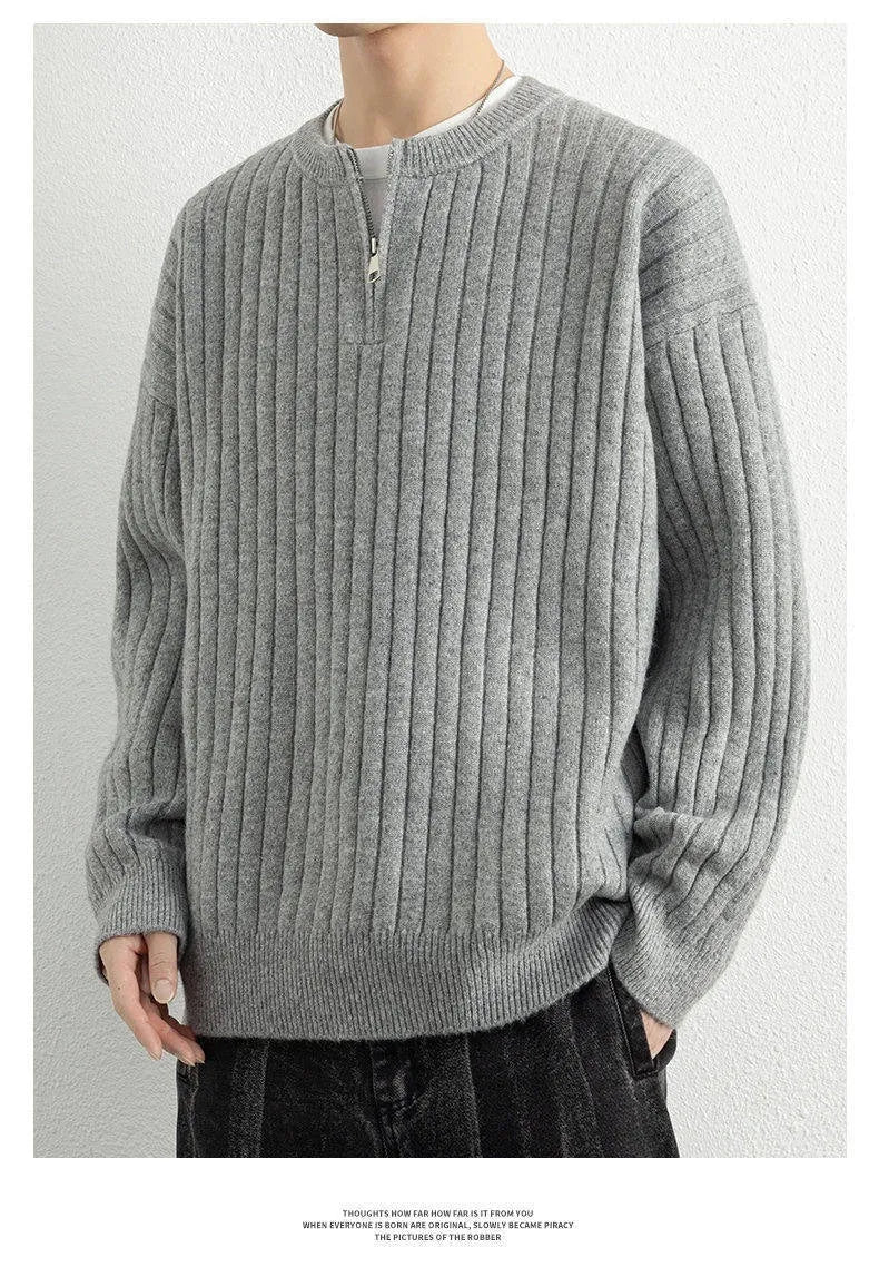 Men's grey half zip sweater with textured knit pattern and loose fit long sleeve design