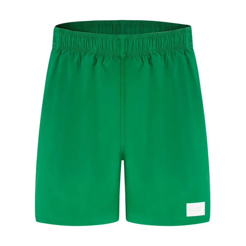Men's quick-drying nylon beach shorts in blue with straight leg opening for swimming and sports