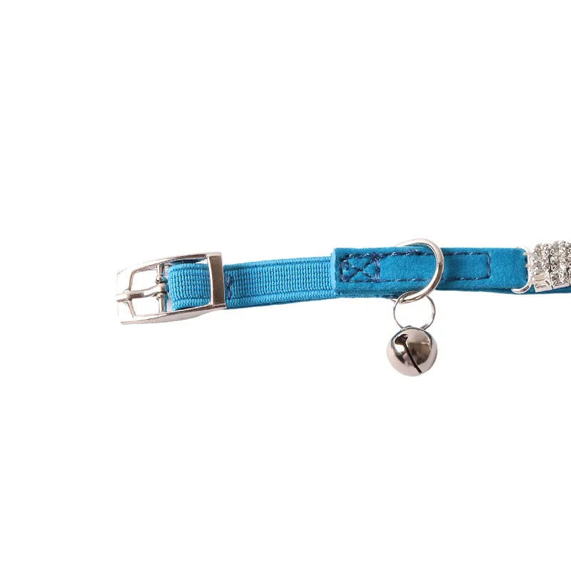 A flocking material cat collar with a flannel lining and an elastic buckle, shown in one of six colours.