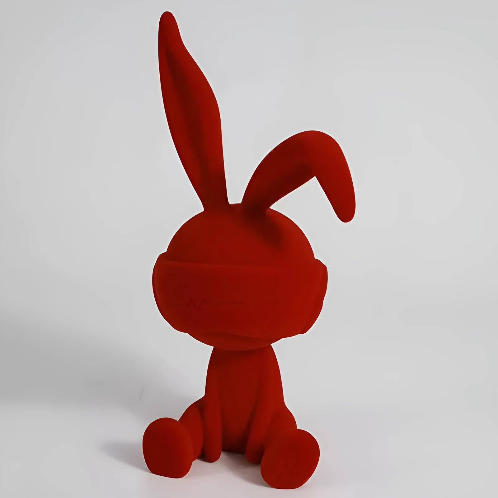 Suede blindfold rabbit resin table ornament in blue, green, or red colours