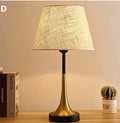 Retro American style alloy bedside lamp with LED lighting on wooden table