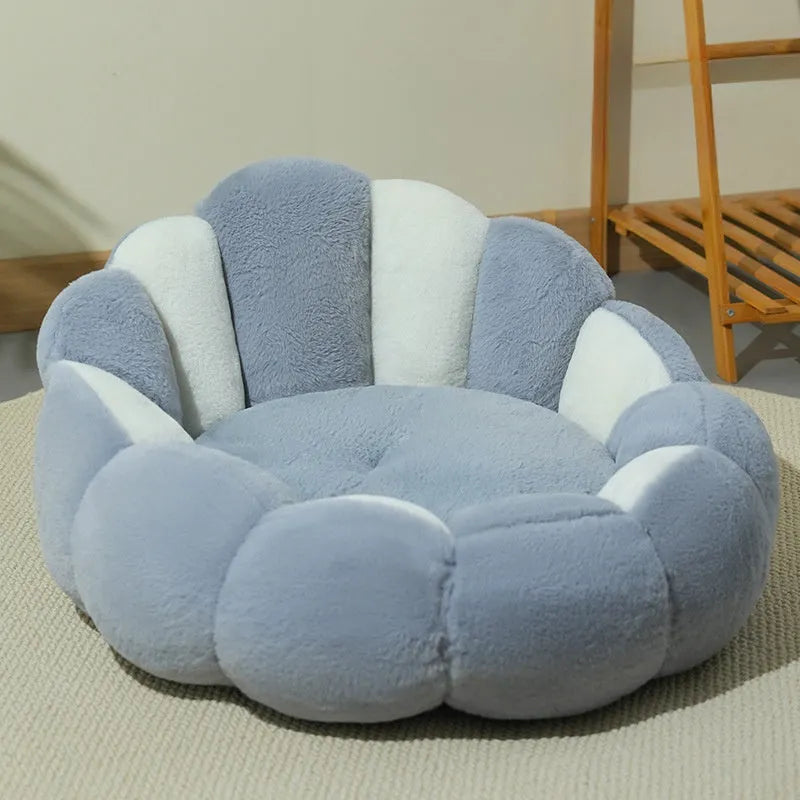 Greyish-white rabbit fur lined pet shell nest bed for cats and small dogs in three sizes.