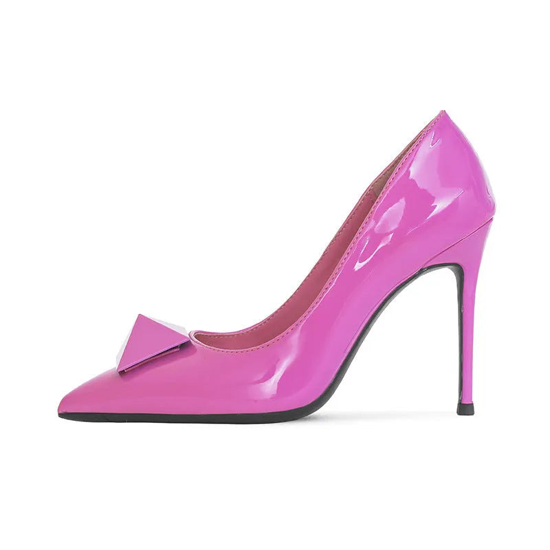 Women's pink patent leather pointed toe stiletto high heels with buckle detail
