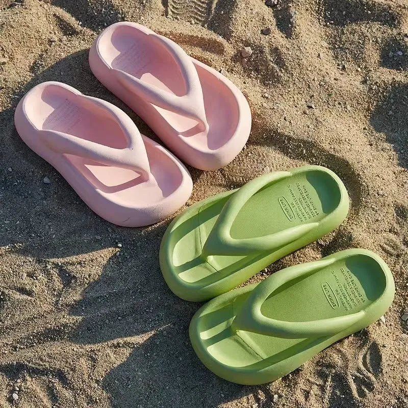 Women's thick-soled EVA flip-flops with a bow detail on the strap, shown in various colours.