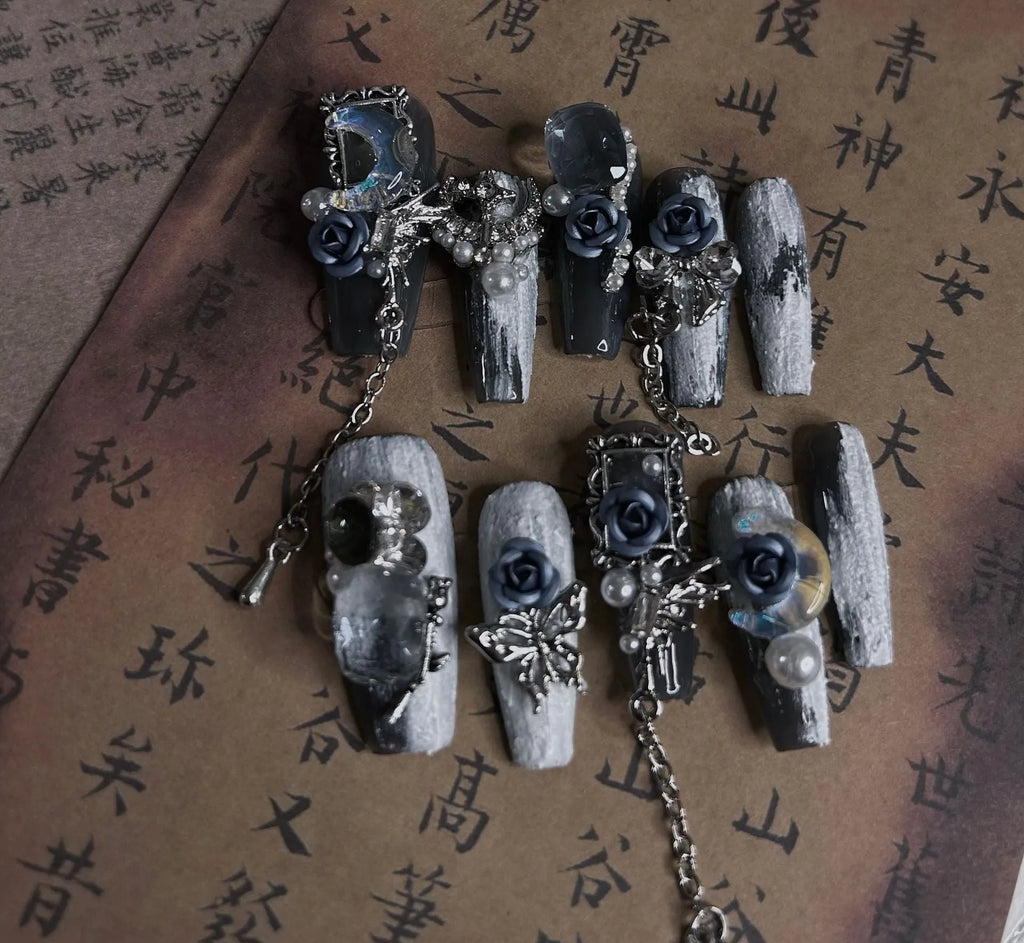 Heavy industry night blue false nails with rose and floral patterns in plastic armour suit
