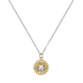 Close-up of a sterling silver sunflower necklace with geometric daisy pendant on an adjustable cross chain.