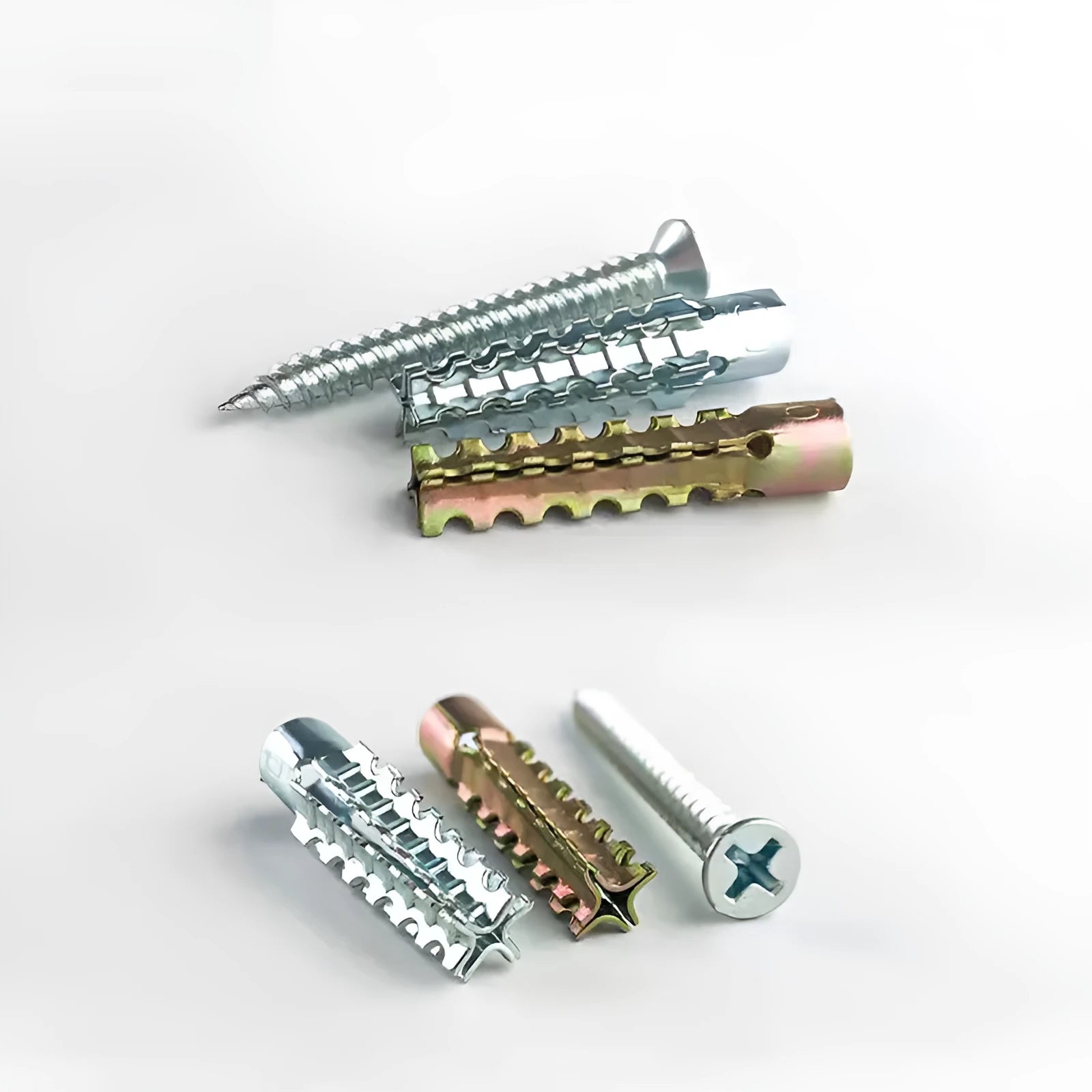 Iron expansion anchors with serrated barbed design for wall fastening in brick and concrete