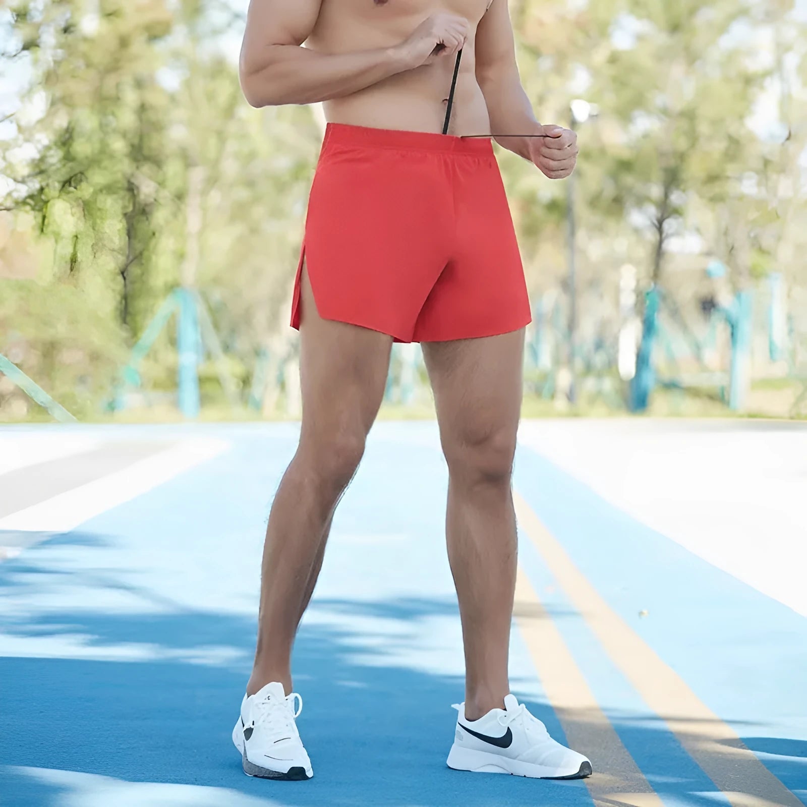 Men's black off-road running shorts with high waist and loose fit for marathon running.