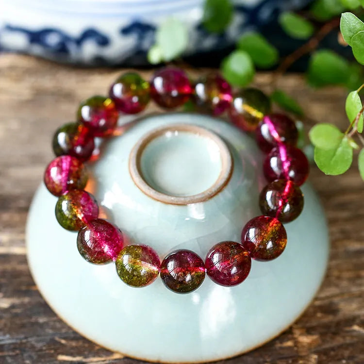 Women's watermelon crystal bracelet showing green and pink striped pattern, available in multiple sizes.