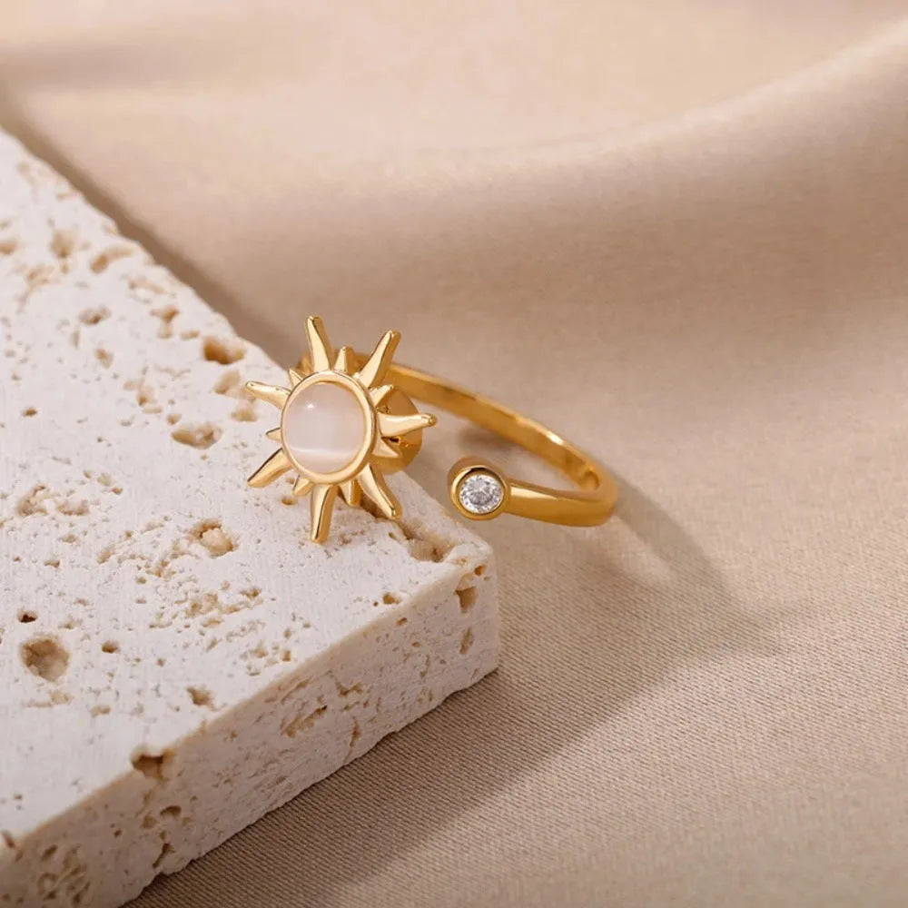 Adjustable copper decompression ring with geometric rotatable design in gold finish