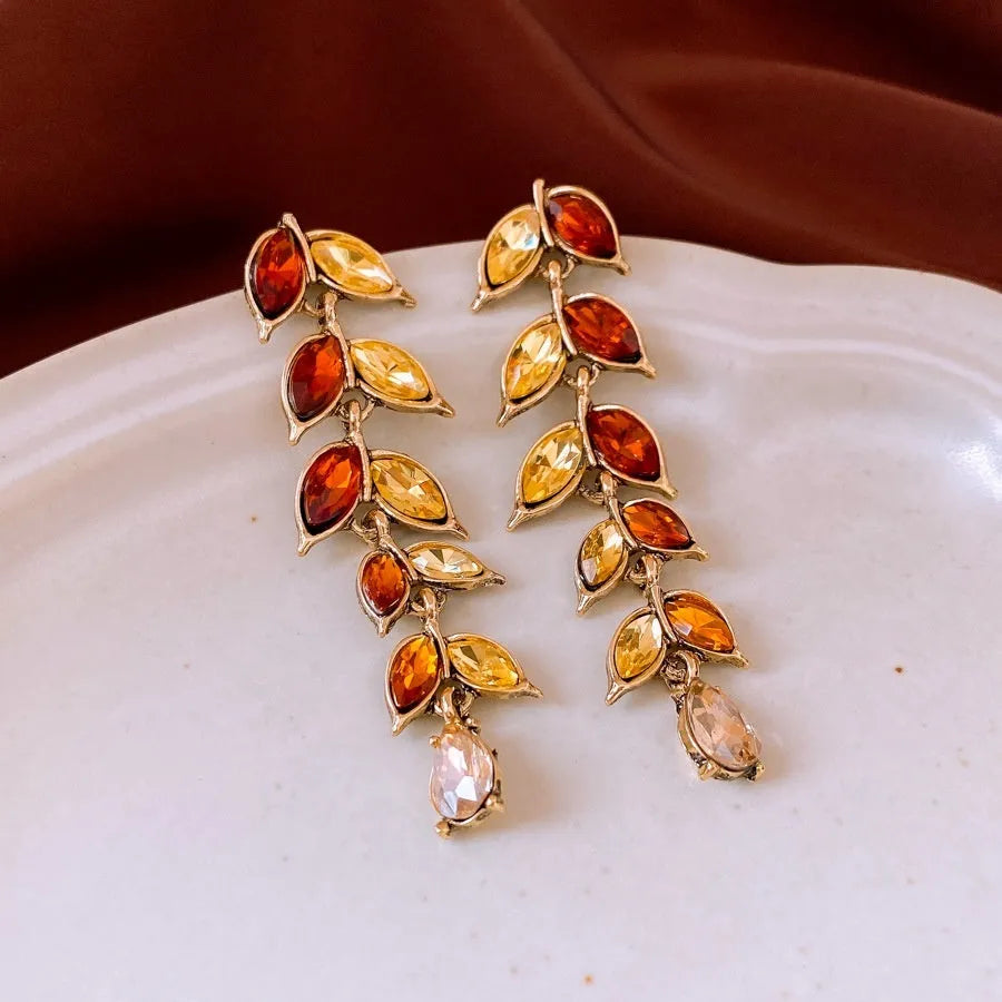 Flower shape alloy pendant necklace and earrings set in golden brown with green accents, 51-60cm adjustable chain, retro wheat design