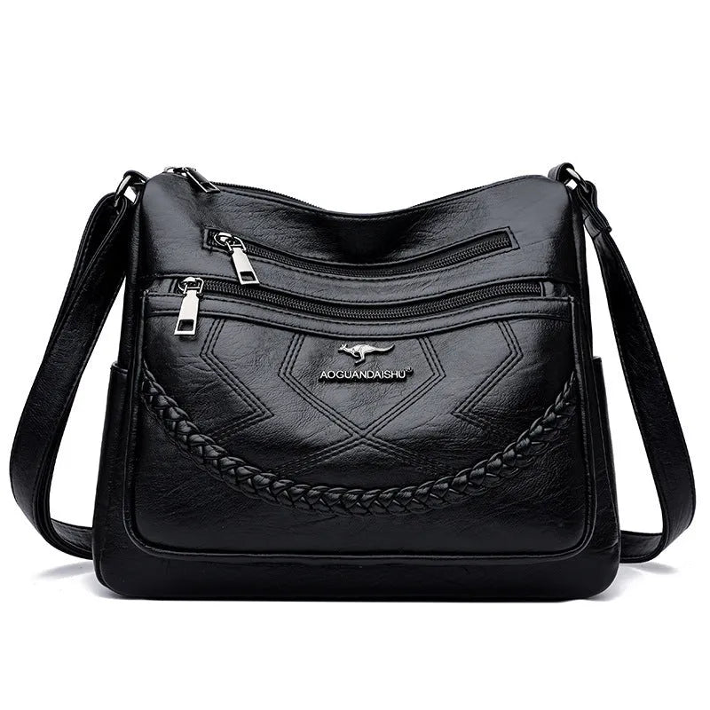 Soft leather women's shoulder bag in horizontal square design with crossbody strap