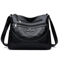 Soft leather women's shoulder bag in horizontal square design with crossbody strap
