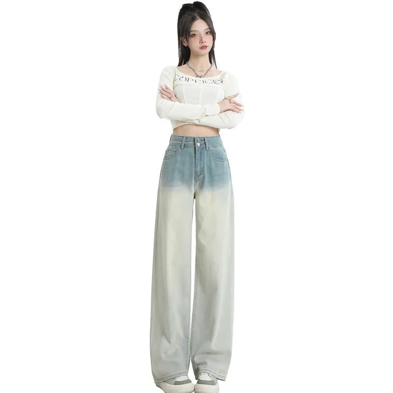 Women's gradient blue straight-leg denim trousers with wide leg fit on hanger