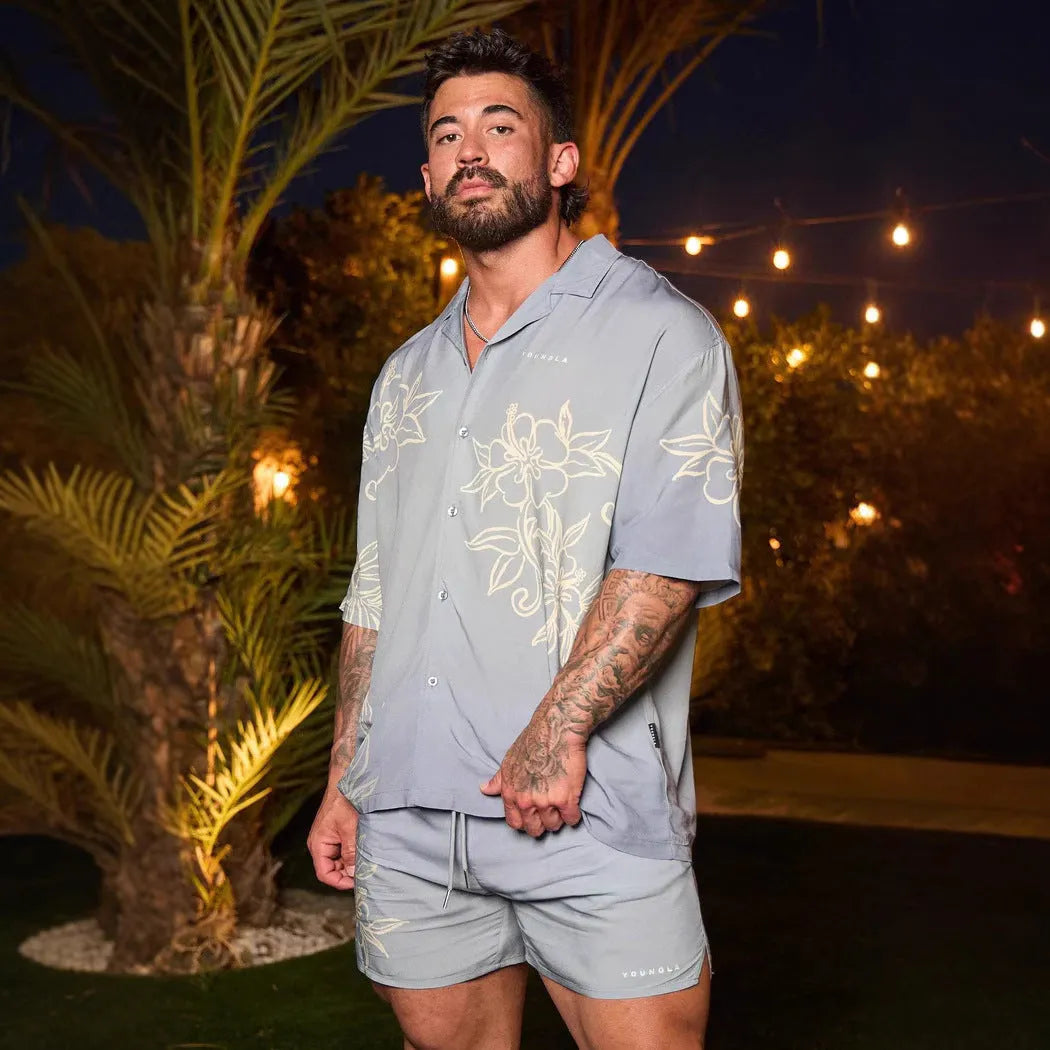 Men's loose fit short sleeve top with floral printed pattern in polyester fabric