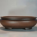 Large purple clay ceramic flowerpot with classical handmade design for indoor desktop plants