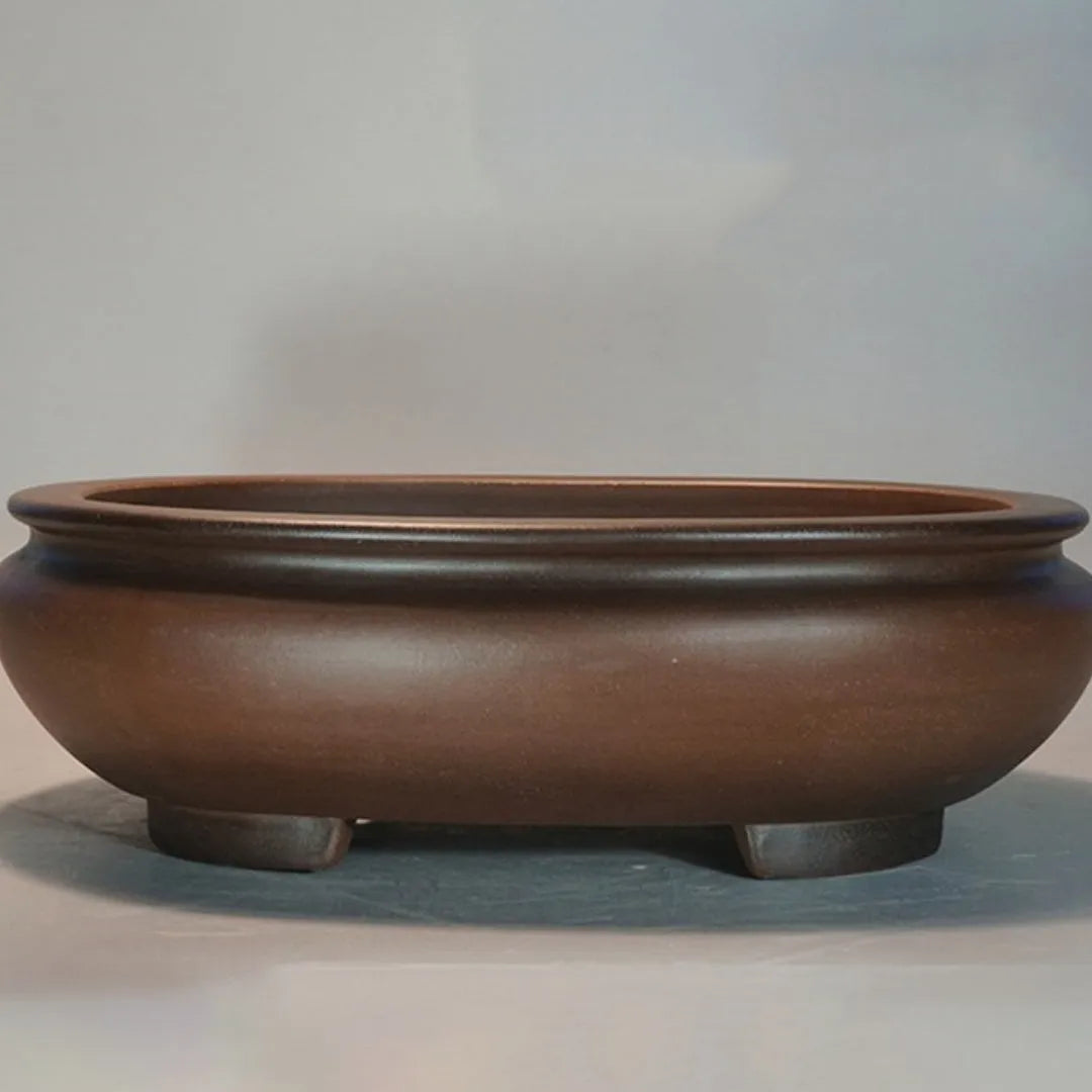 Large purple clay ceramic flowerpot with classical handmade design for indoor desktop plants