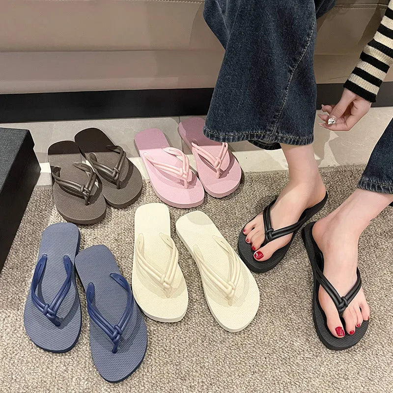 Men's PVC flip flops in beige with a non-slip sole and toe-covering style.