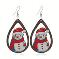Wooden Christmas earrings with printed tree and snowman designs in festive colours