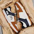 Casual lace-up sneakers in simple plain style with wear-resistant construction