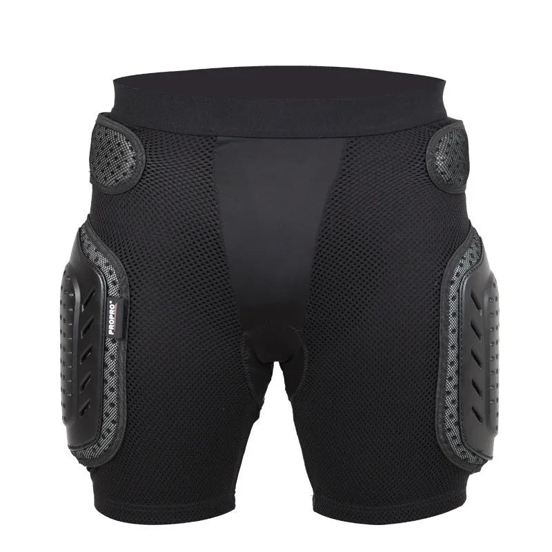 Black cycling hip protection pants shown flat, highlighting the hip pad area and available in sizes S, M, L, XL.