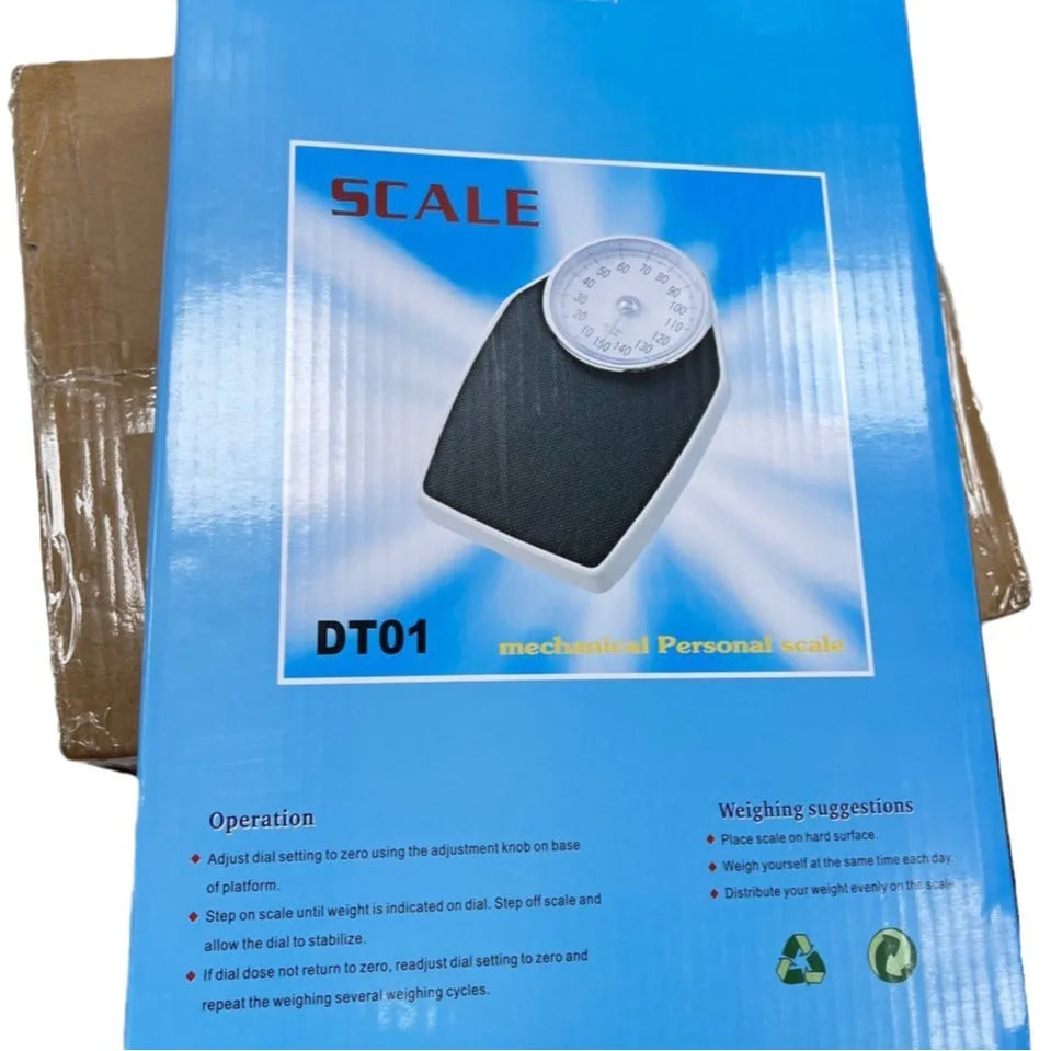 Black mechanical bathroom weight scale with large dial on a 47x35cm platform.