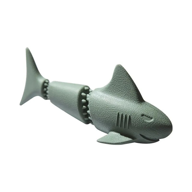 Deep sea shark design rubber dog toy shown in conch blue, conch green, starfish blue, and starfish green colour variations.