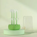 Soft silicone pet toothbrush for dogs and cats in blue, green, and purple colour options