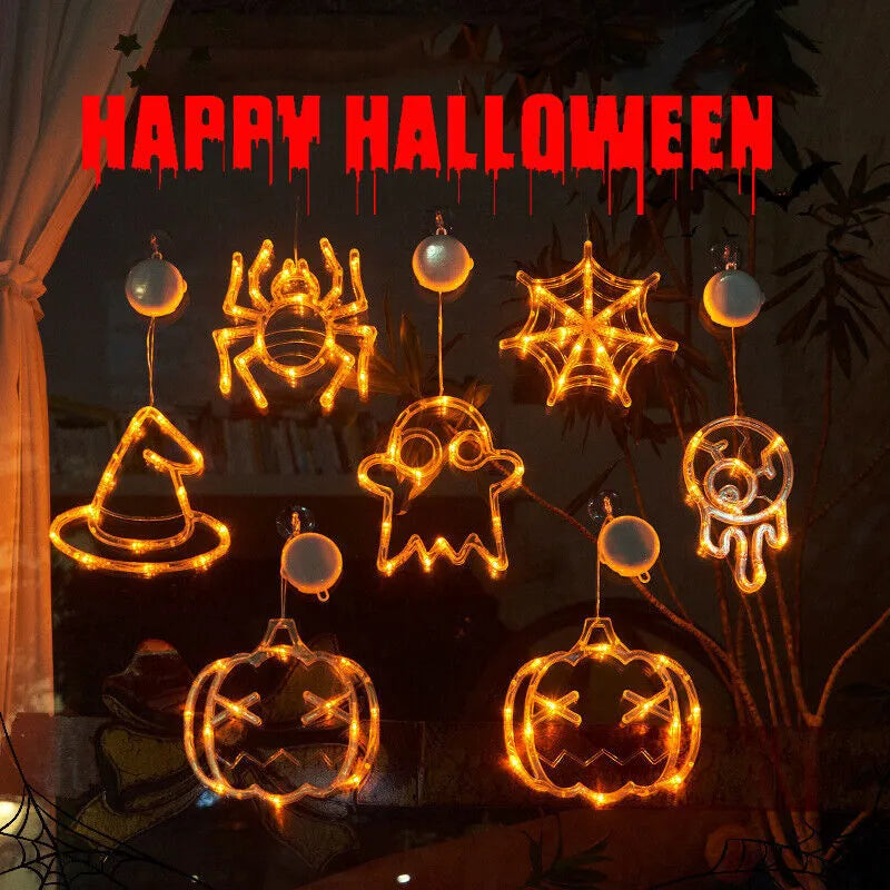 Halloween window hanging LED lights set with seven plastic decorations including spider, pumpkin, and ghost designs