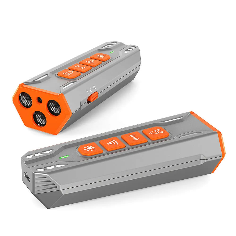 Three head ultrasonic dog trainer with LED light in grey and orange colour.