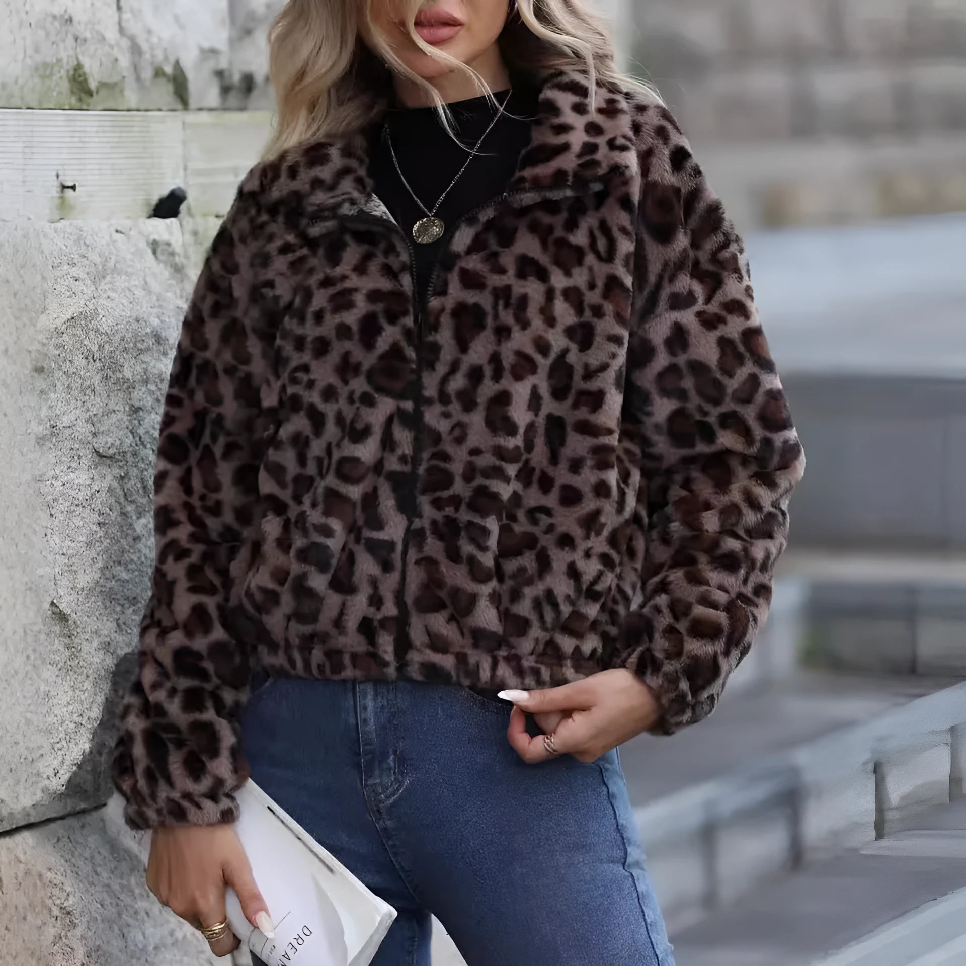 Women's loose leopard print plush coat with zipper front and raglan sleeves.