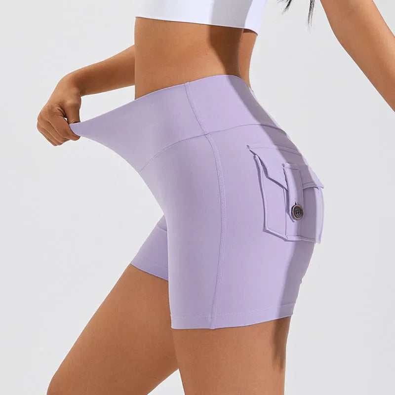 Women's high waist fitness shorts in electric blue colour with side pockets for summer sports