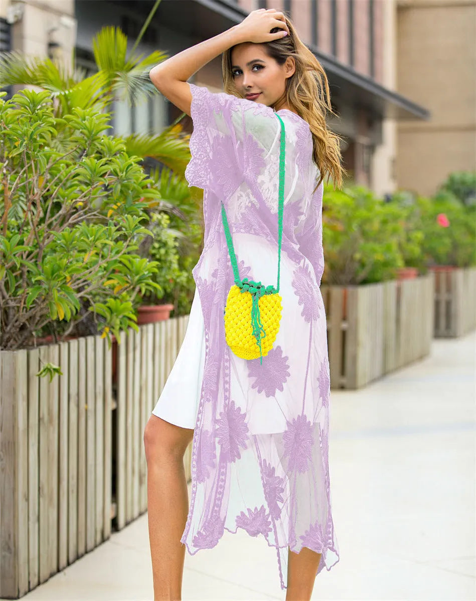 Light purple women's beach dress with lace embroidery detail as swimsuit cover-up