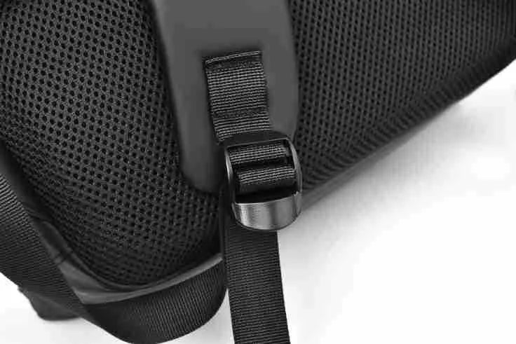 Large black waterproof PU leather backpack for men with simple design and sewing thread details.