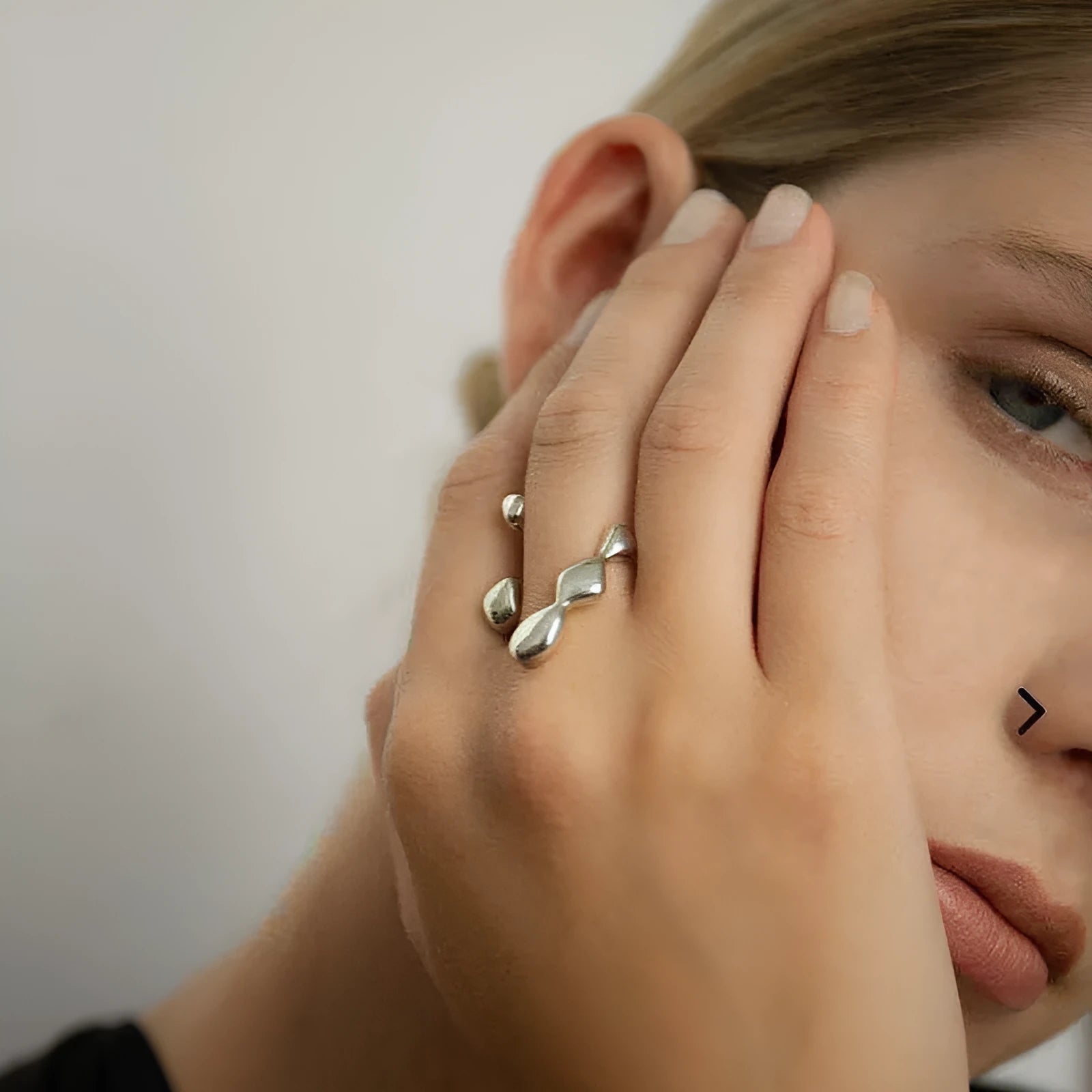 Brass fashion ring with spherical elements in circular design available in gold and silver colours