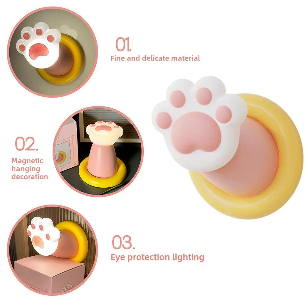 Cat paw desk lamp with outstretched claw design showing tap control and adhesive back