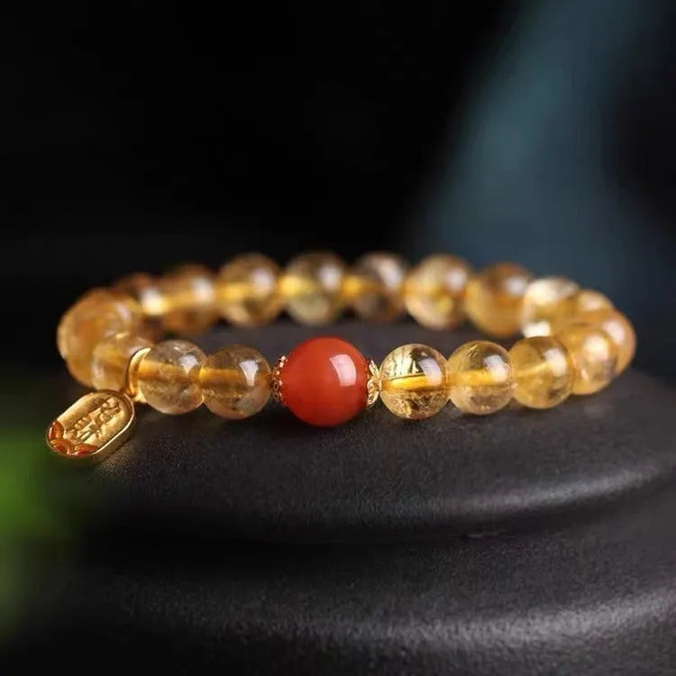 Natural red agate bead bracelet with a gold-plated clasp, showing 6mm, 8mm, and 10mm size options.