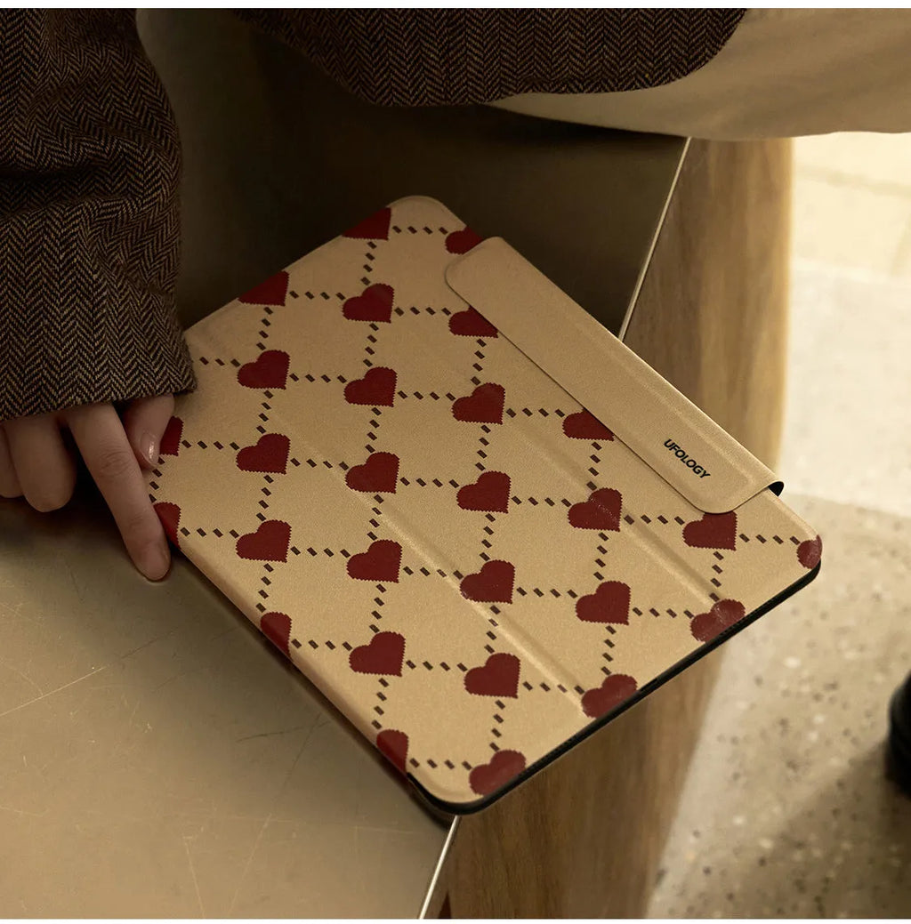 Black polyurethane magnetic case for iPad Air 5/Air 4 with a double-sided suction clip attached to a fridge.