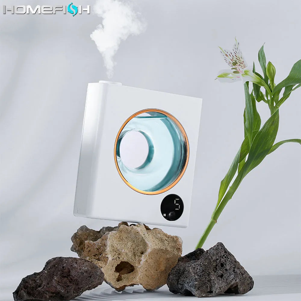 White wall mounted automatic aromatherapy sprayer with USB charging port.