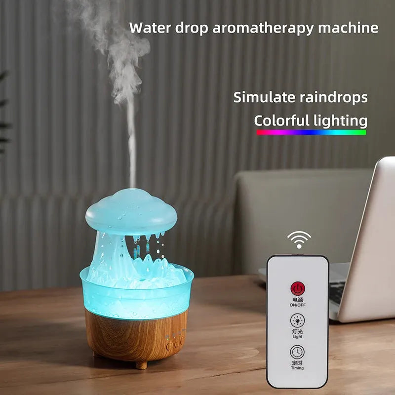 Wood grain white cloud-shaped humidifier and essential oil diffuser with coloured LED night light on a table.