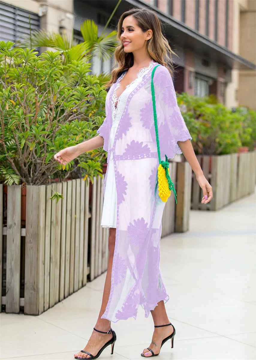 Light purple women's beach dress with lace embroidery detail as swimsuit cover-up