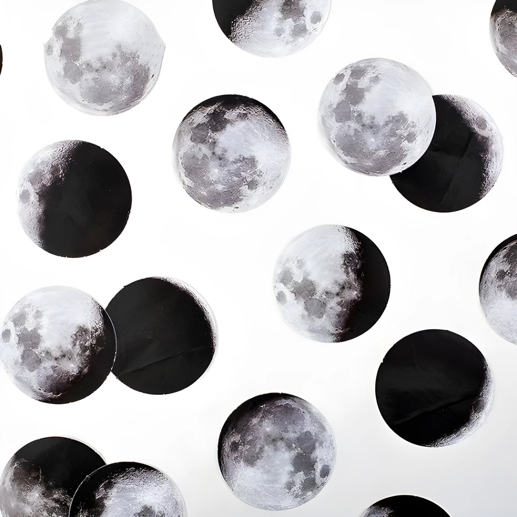 Black moon phase, planet, and calendar design stickers on a sheet, 45 pieces total.