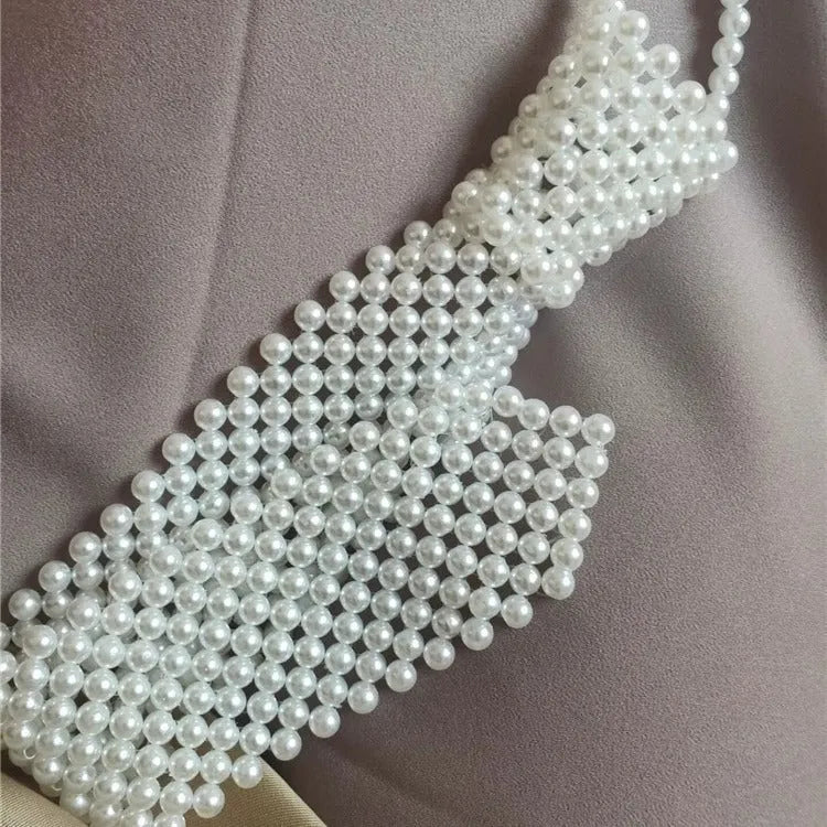 Retro hollow out imitation pearl body chain with alloy tie fastening in black colour