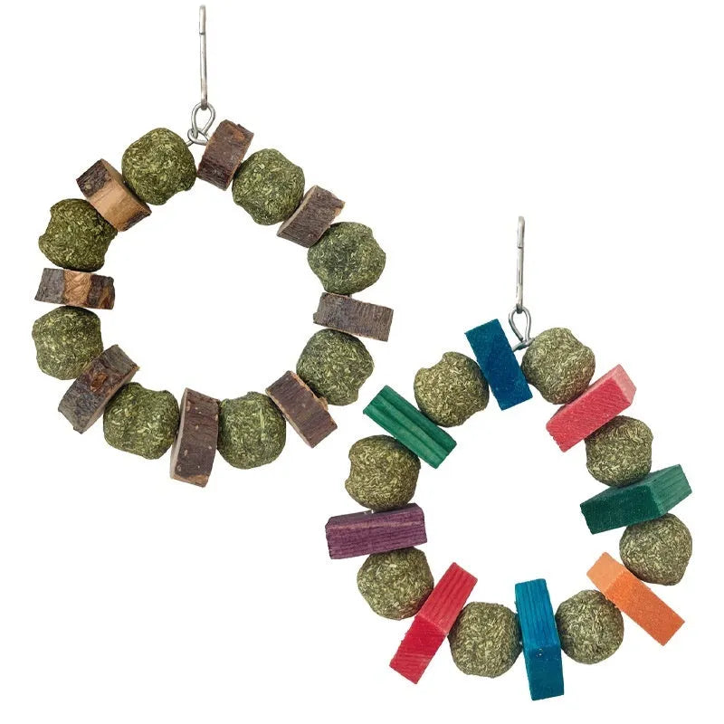 Hamster chew toy with decorative ring and straw ball for guinea pigs and rabbits