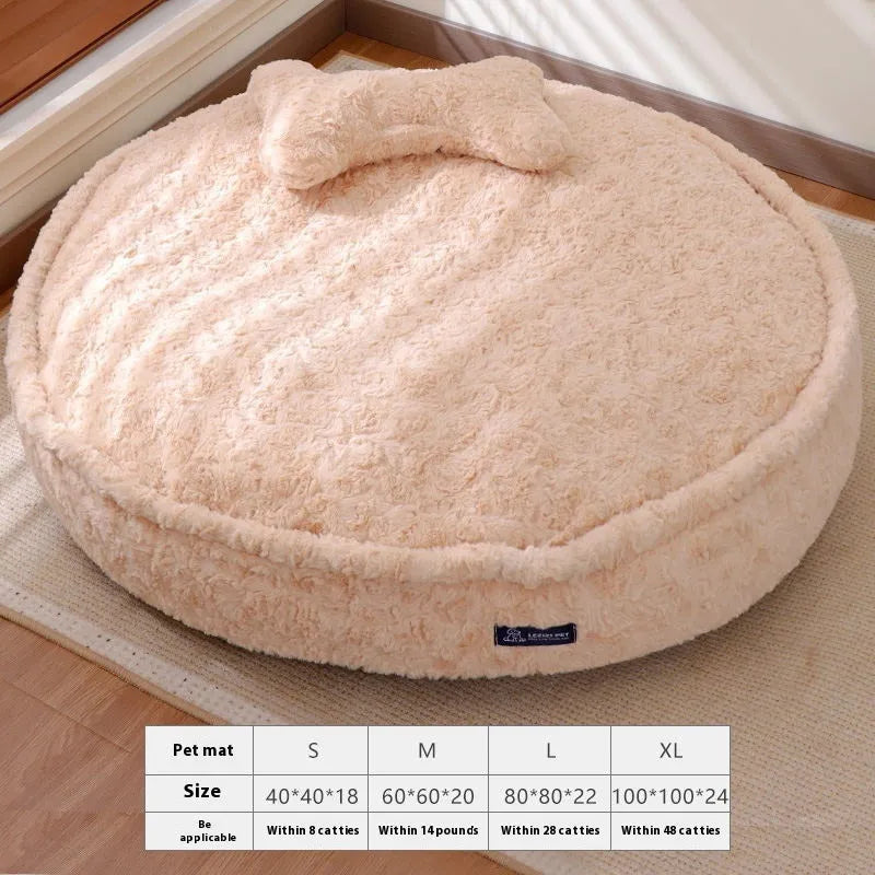 Round nest pet bed with a removable cover in a milk tea colour on a wooden floor