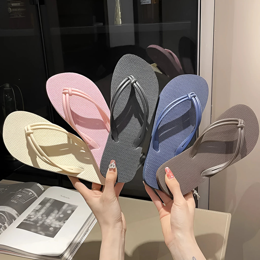 Men's PVC flip flops in beige with a non-slip sole and toe-covering style.